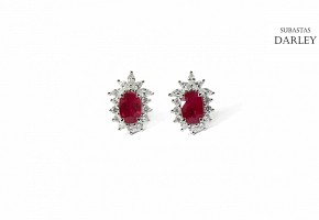 Short earrings with rubies and diamonds.