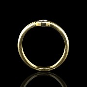 Doble anillo de oro amarillo 18 k con brillante