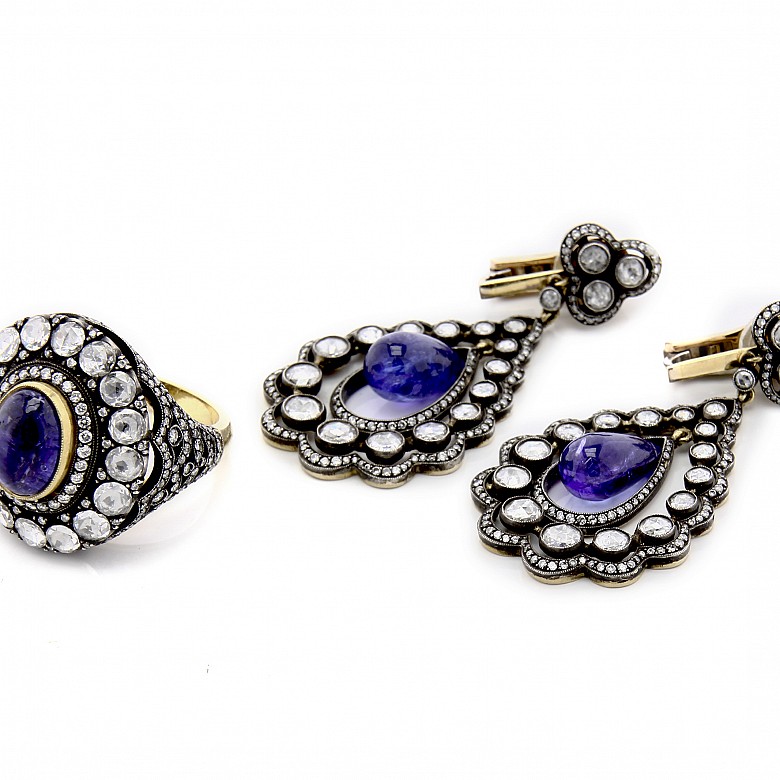 Ring and earring set in 18k gold with tanzanite and diamonds.