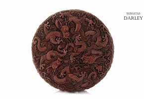 A carved cinnabar lacquer 