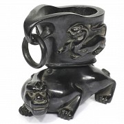 A lion shaped chinese wooden cup.