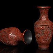 Pair of red lacquer vases, 20th century