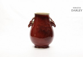 Red-glazed porcelain vase, China, 19th century.