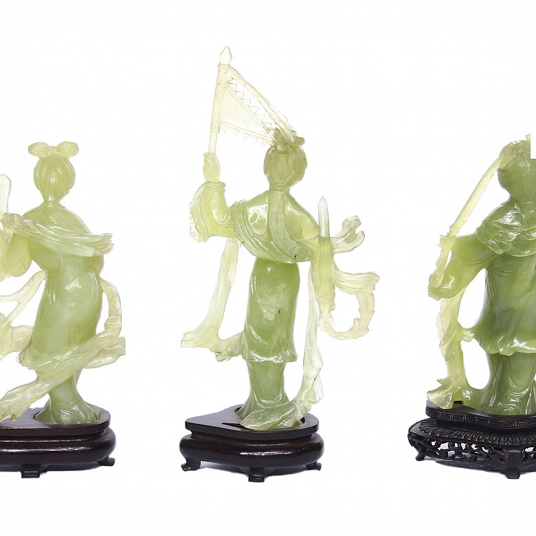 Three carved jade dancers, 20th century
