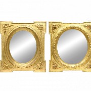 Pair of carved and gilded wood mirrors, 20th century