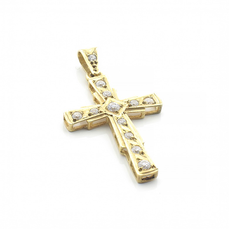 Cruz de oro amarillo 18 k con siete circonitas
