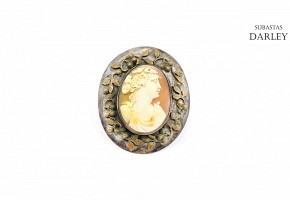 Silver cameo with agate center.