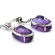 Earrings in 18 k white gold with amethysts and diamonds.