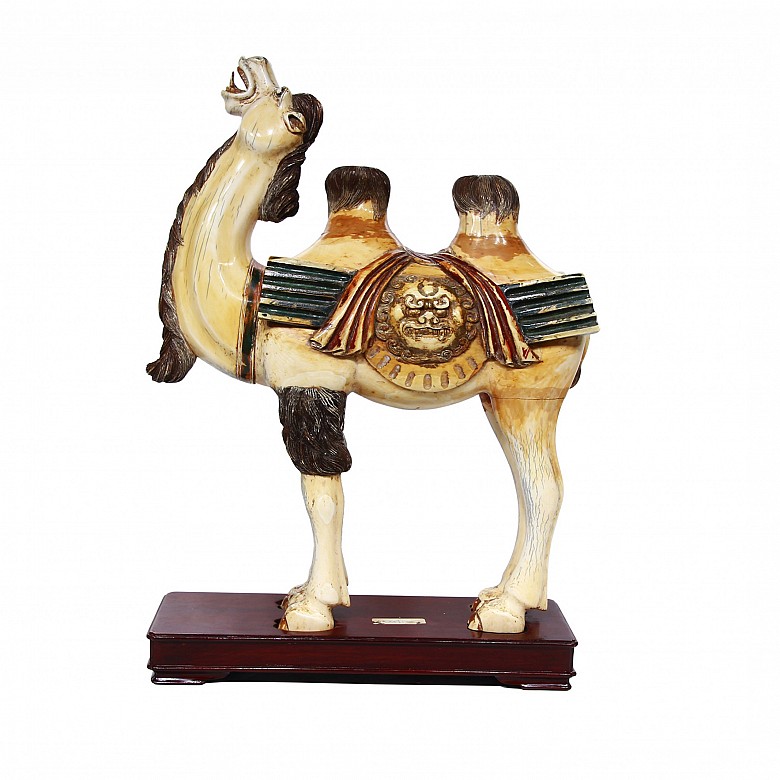 Large ivory camel with polychrome details, China, early 20th century