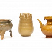 Lote of three glazed pottery pieces, China.