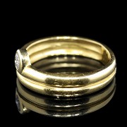 Doble anillo de oro amarillo 18 k con brillante