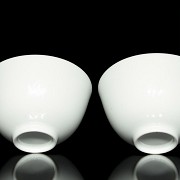Pair of white-glazed 