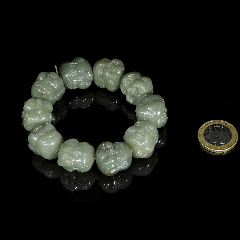 Pulsera de jade con cabezas de Buda, S.XX