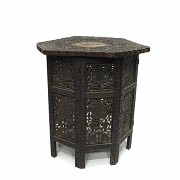 Carved wood table with a base, s.XX