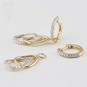 Pair of earrings with movement, in 18k yellow gold and 74 diamonds total weight 0.70cts. - 1