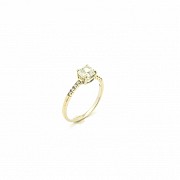 18k yellow gold ring, center with natural diamond.