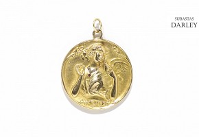 18 kt yellow gold medal, with diamonds and a ruby, ca.1920