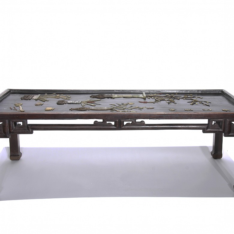Chinese table with appliqués on the top, 20th century