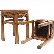 Two stools with walnut root seats.