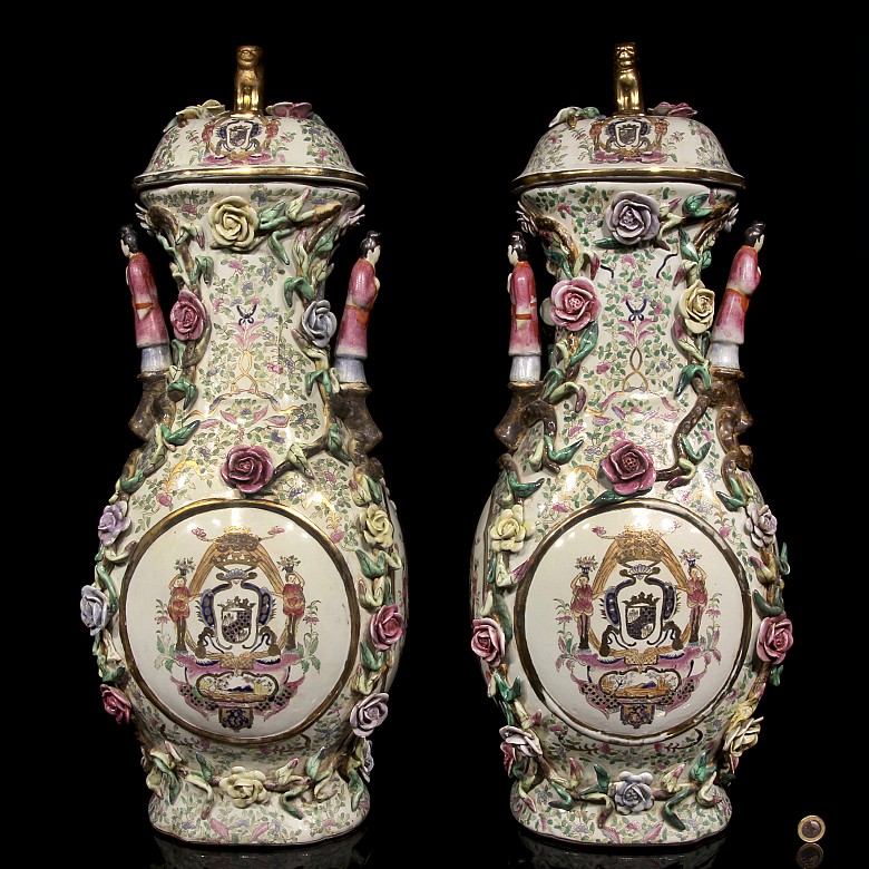 Pair of vases with reliefs.