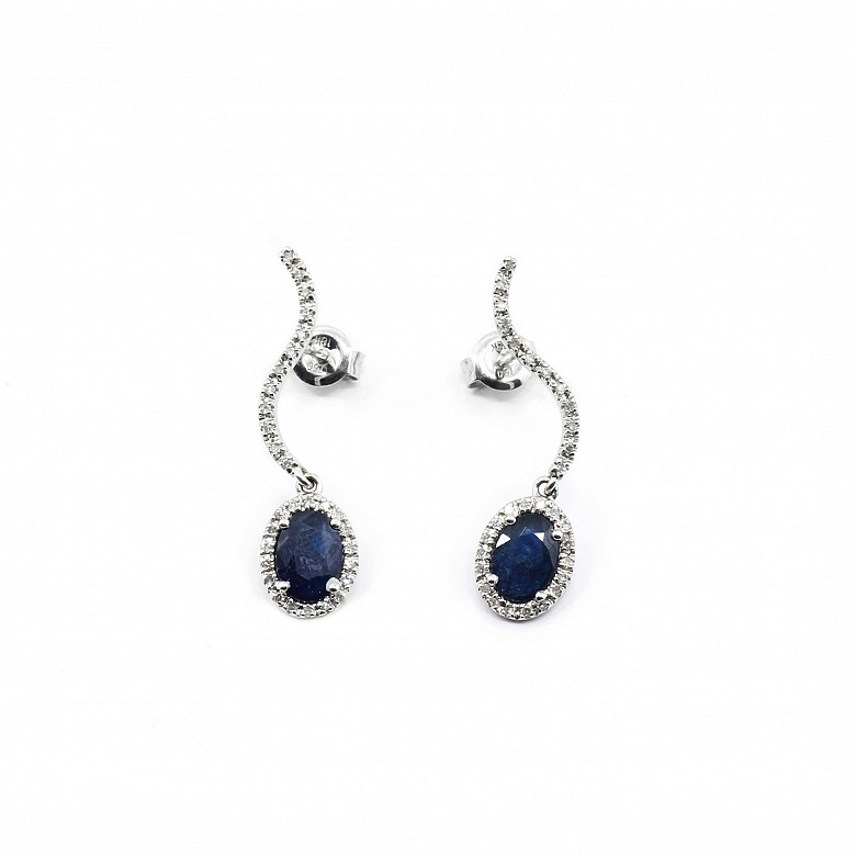 18k white gold and sapphire earrings.