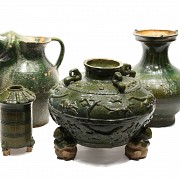 Lot of four green-glazed pottery containers.