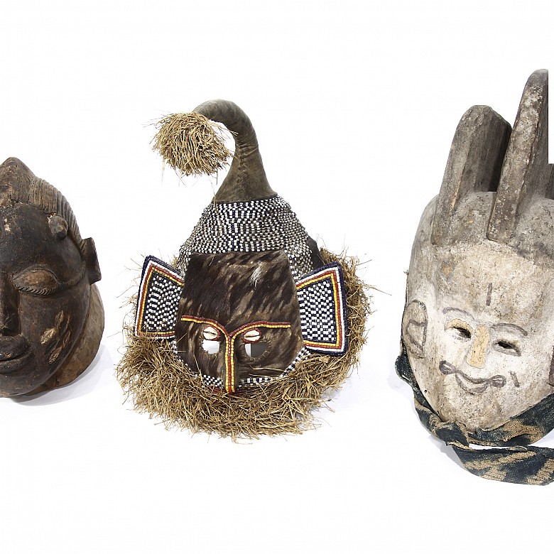 Three African masks. - 2