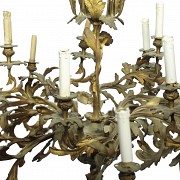 A large chandelier in golden metal, 20th century