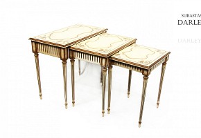 Three tables in white and gold lacquered wood, 20th century