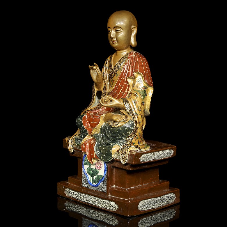 Buda porcelana con firma 