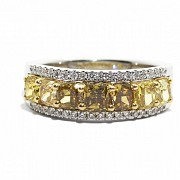 Half alliance ring with yellow fancy diamonds.