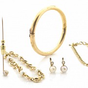 Set of pieces in 18k yellow gold